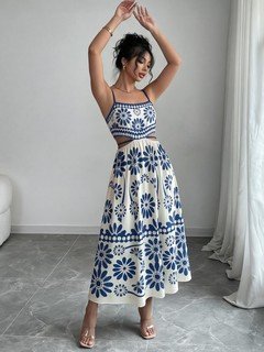 Full length front view of the blue porcelain floral-print spaghetti-strap maxi dress, showing the silhouette and fit.
