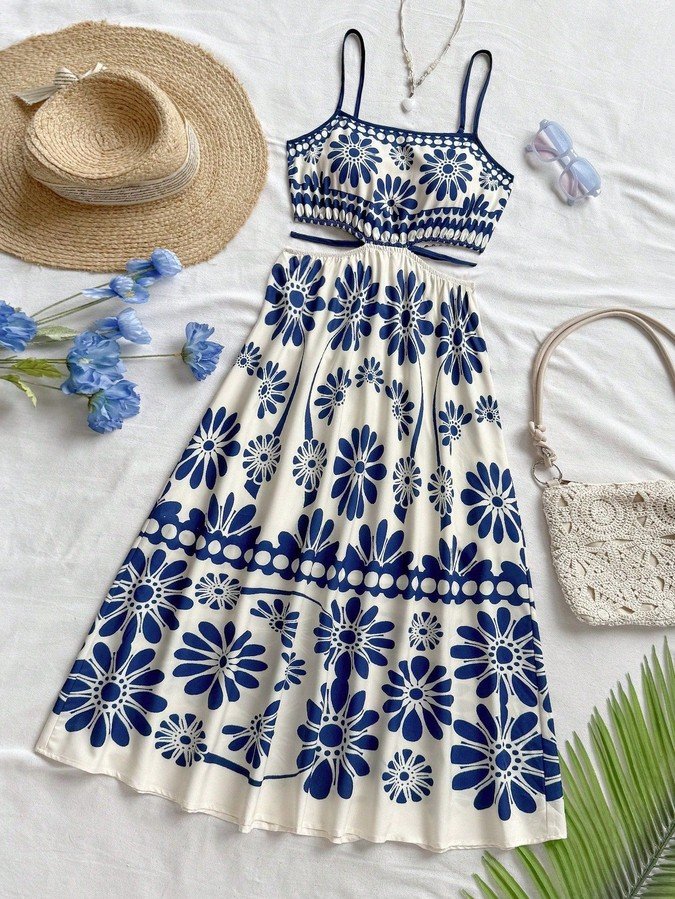 Alternate flat lay of the blue porcelain floral smocked-bodice spaghetti-strap maxi dress, showing the garment shape and available styling.