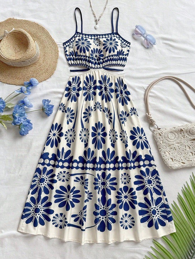 Styled flat lay of the blue porcelain floral smocked-bodice spaghetti-strap maxi dress, showing the garment shape and available styling.