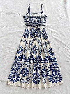 Garment back view of the blue porcelain floral smocked-bodice spaghetti-strap maxi dress, showing the silhouette and fit.