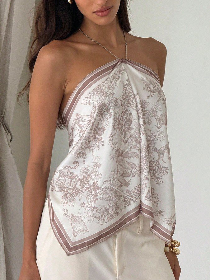 Front view of the beige printed halter scarf top, showing its silhouette and design details.