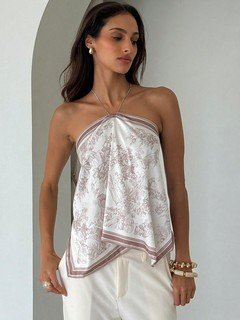 Full-length front view of the beige printed halter scarf top, showing its silhouette and design details.