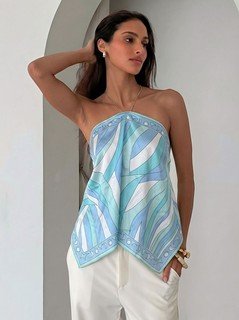 Angled front view of the blue printed halter scarf top, showing its silhouette and design details.