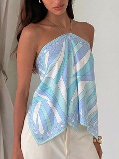 Lifestyle front view of the blue printed halter scarf top, showing its silhouette and design details.