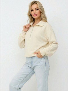 Back view of the cream quarter-zip collared sweatshirt, showing its silhouette and design details.