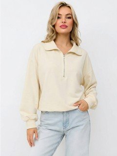 Front view of the cream quarter-zip collared sweatshirt, showing its silhouette and design details.