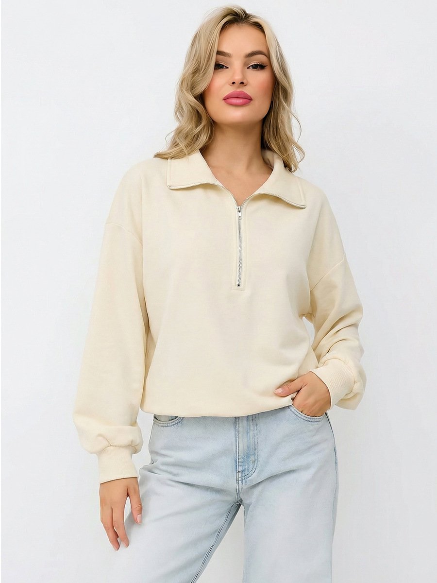 Cream Quarter-Zip Collared Sweatshirt – Front View Front view of the cream quarter-zip collared sweatshirt, showing its silhouette and design details.
