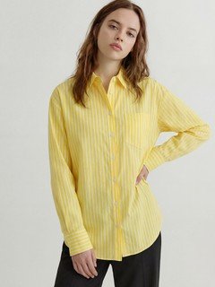 Angled front view of the yellow striped button-front shirt, showing its silhouette and design details.