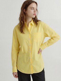 Styled front view of the yellow striped button-front shirt, showing its silhouette and design details.