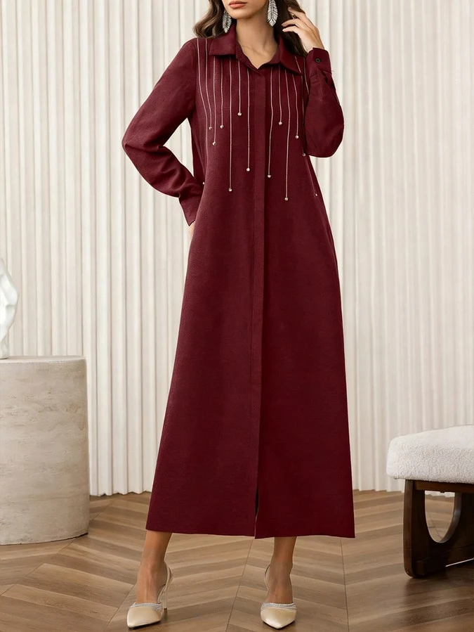 Full length front view of the burgundy rhinestone-embellished collared long-sleeve maxi dress, showing the silhouette and fit.