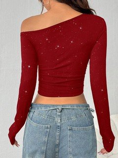 Back view of the burgundy rhinestone one-shoulder crop top, showing its silhouette and design details.