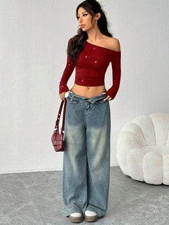 Full-length front view of the burgundy rhinestone one-shoulder crop top, showing its silhouette and design details.
