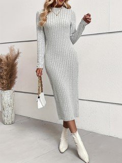 Styled front view of the light gray ribbed mock-neck midi dress, showing its silhouette and design details.