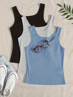Assorted flat lay of the assorted colors ribbed sleeveless cropped tank top collection, showing the garment shape and available styling.