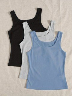 Assorted flat lay of the assorted colors ribbed sleeveless cropped tank top collection, showing the garment shape and available styling.