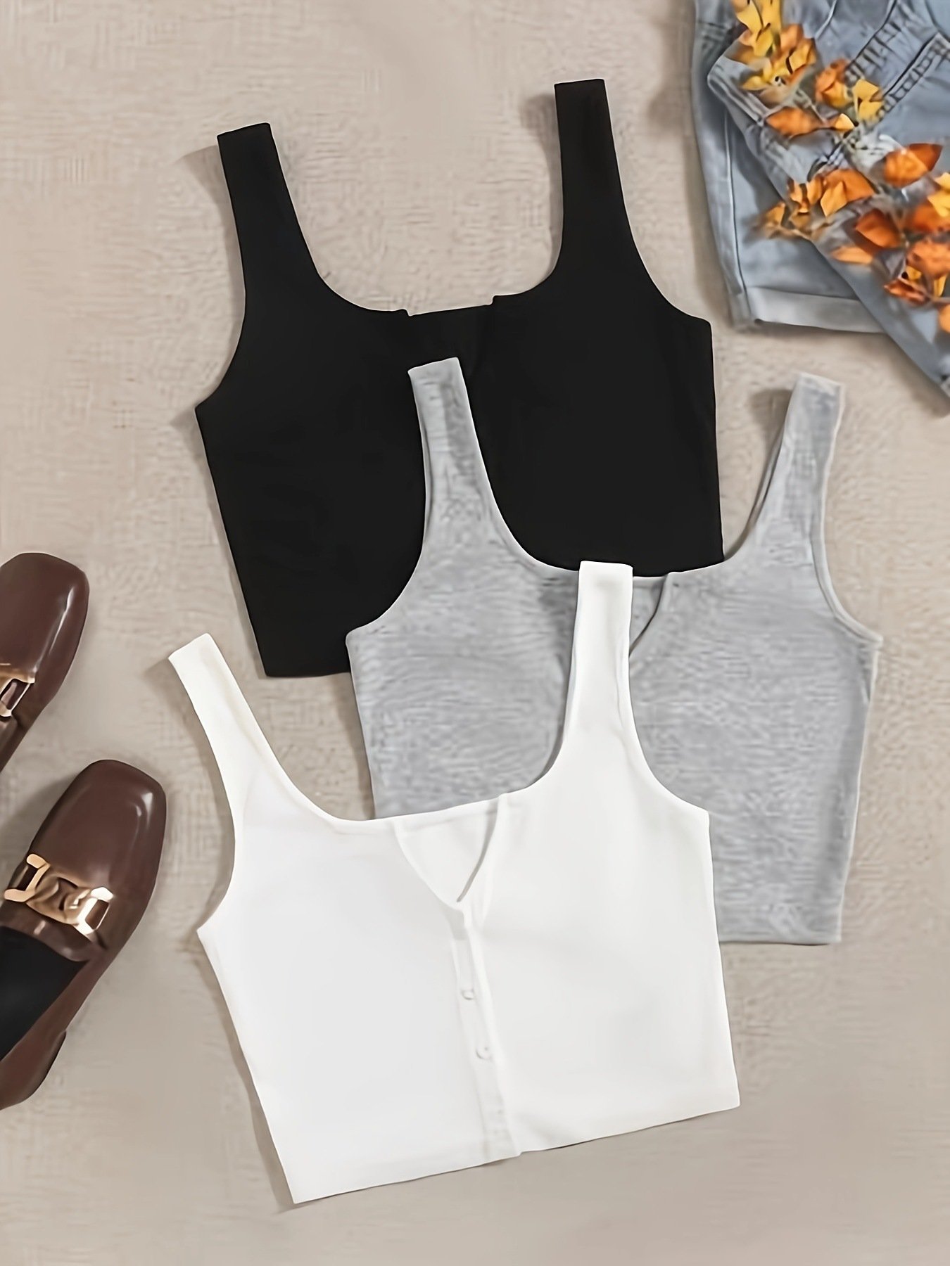 Assorted Colors Ribbed Square-Neck Button-Front Cropped Tank Top – Flat Lay Flat lay of the assorted colors ribbed square-neck button-front cropped tank top, showing the garment shape and available styling.