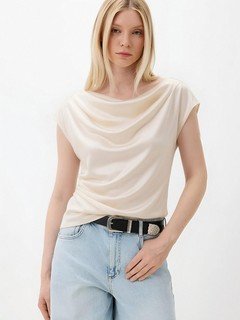 Front view of the champagne satin cowl-neck cap-sleeve blouse, showing its silhouette and design details.