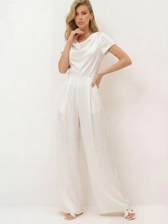 Full-length front view of the ivory satin cowl-neck wide-leg jumpsuit, showing its silhouette and design details.