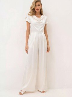 Styled front view of the ivory satin cowl-neck wide-leg jumpsuit, showing its silhouette and design details.