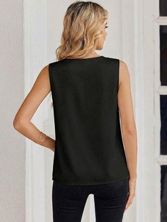 Back view of the black satin v-neck sleeveless blouse, showing its silhouette and design details.