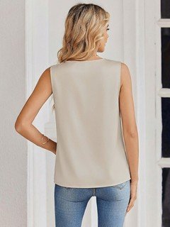 Back view of the champagne satin v-neck sleeveless blouse, showing its silhouette and design details.