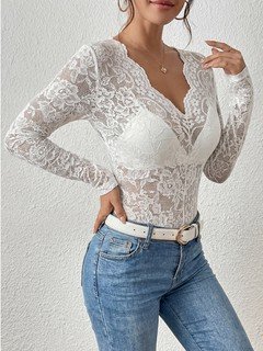 Alternate front view of the white scalloped v-neck lace top, showing its silhouette and design details.