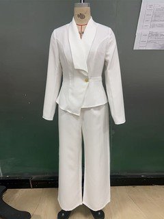 Mannequin view of the ivory shawl-collar blazer pants set, showing the garment shape and construction.