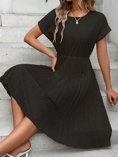 Styled front view of the black short-sleeve pleated midi dress, showing its silhouette and design details.