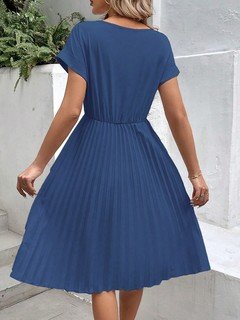 Back view of the blue short-sleeve pleated midi dress, showing its silhouette and design details.