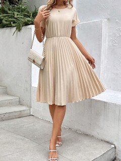 Full-length front view of the cream short-sleeve pleated midi dress, showing its silhouette and design details.