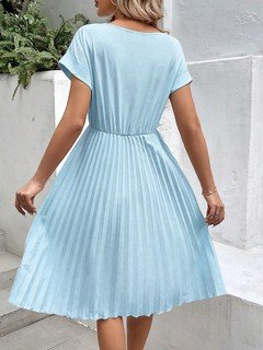 Back view of the light blue short-sleeve pleated midi dress, showing its silhouette and design details.