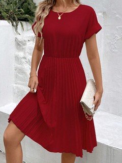 Front view of the red short-sleeve pleated midi dress, showing its silhouette and design details.
