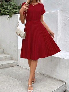 Full-length front view of the red short-sleeve pleated midi dress, showing its silhouette and design details.