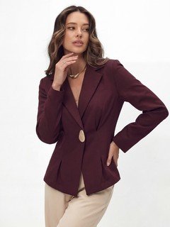 Angled front view of the burgundy single-button fitted blazer, showing its silhouette and design details.