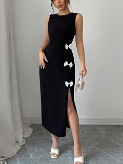 Front view of the black bow-trim side-slit midi dress, showing its silhouette and design details.