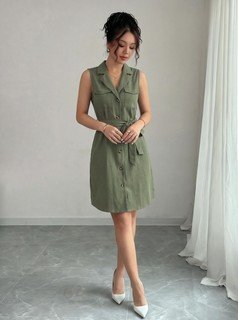 Studio front view of the olive sleeveless button-front belted shirt dress, showing the silhouette and fit.