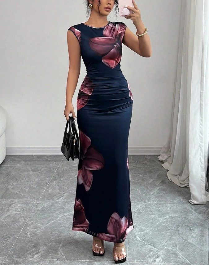 Front view of the navy floral ruched bodycon maxi dress, showing its silhouette and design details.