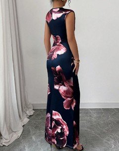 Back view of the navy floral ruched bodycon maxi dress, showing its silhouette and design details.