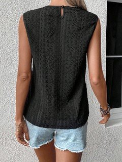 Back view of the black floral lace yoke sleeveless top, showing its silhouette and design details.