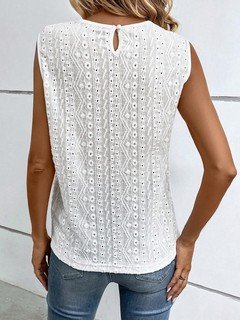 Back view of the white floral lace yoke sleeveless top, showing its silhouette and design details.