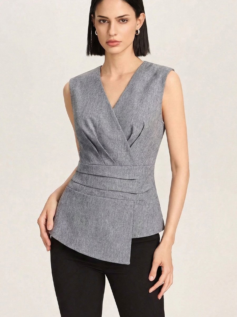 Gray V-Neck Asymmetric Wrap Top – Front View Front view of the gray v-neck asymmetric wrap top, showing its silhouette and design details.