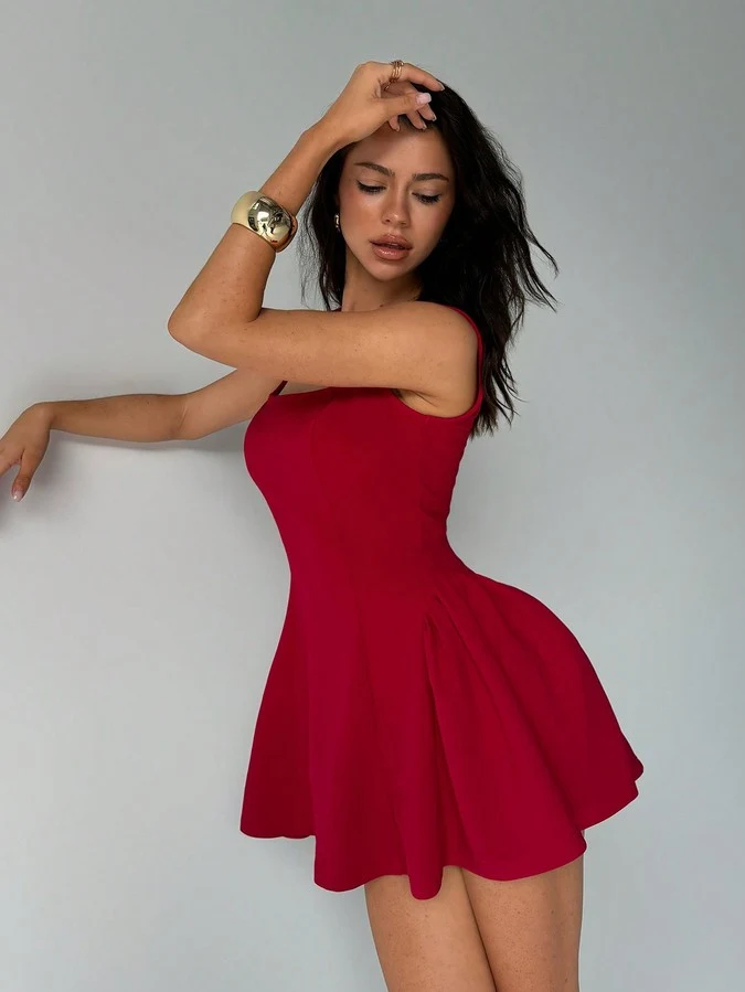 Front view of the red solid square-neck sleeveless skater mini dress, showing the silhouette and fit.