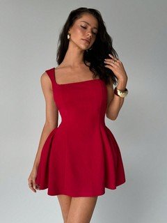 Angled front view of the red solid square-neck sleeveless skater mini dress, showing the silhouette and fit.