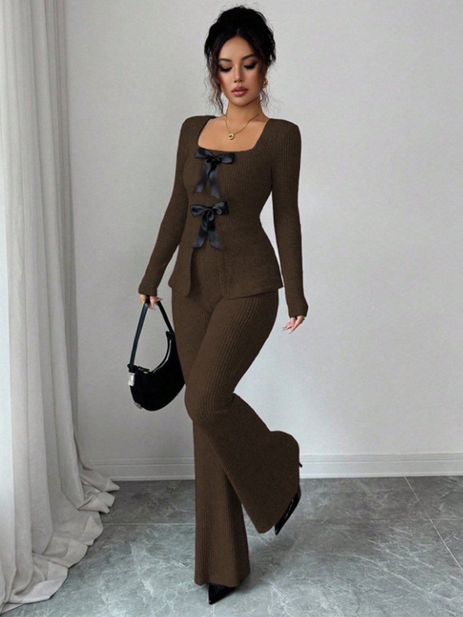 Brown Bow-Front Top and Flared Pants Set – Front View Front view of the brown bow-front top and flared pants set, showing its silhouette and design details.
