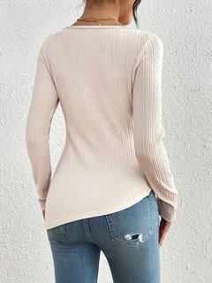 Back view of the ivory square-neck drawstring-ruched long-sleeve top, showing the silhouette and fit.
