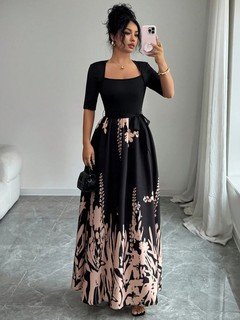 Full length front view of the black square-neck floral-hem three-quarter-sleeve maxi dress, showing the silhouette and fit.