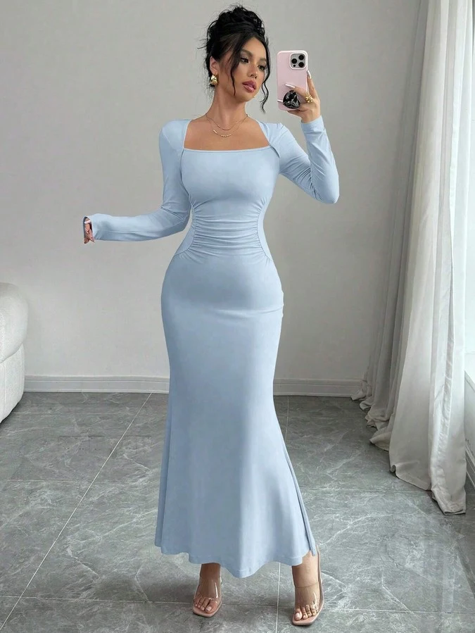 Front view of the light blue square-neck fishtail maxi dress, showing its silhouette and design details.