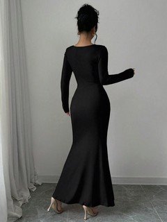 Back view of the black square-neck fishtail maxi dress, showing its silhouette and design details.
