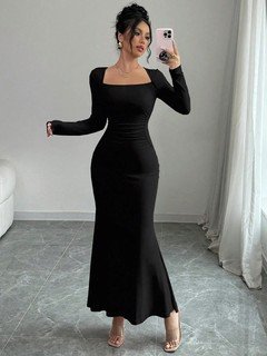 Styled front view of the black square-neck fishtail maxi dress, showing its silhouette and design details.