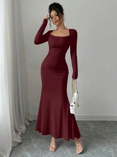 Lifestyle front view of the burgundy square-neck fishtail maxi dress, showing its silhouette and design details.